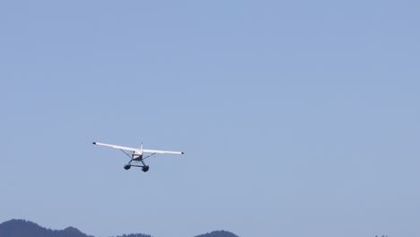 seaplane flies away at canada's west coast in tofino on vancouver island
