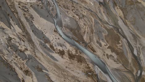 Tilting-aerial-top-view-of-braided-Tasman-river-in-New-Zealand