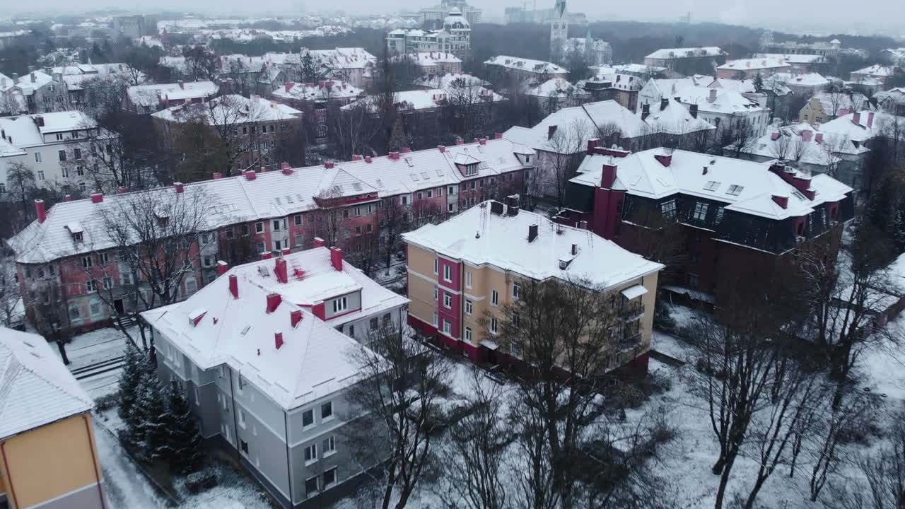 Winter Cityscape with Snow-Covered Buildings