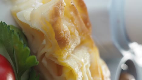 close-up of a stacked savory pastry