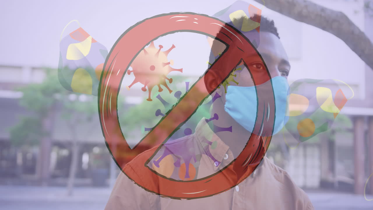 signo de parada sobre células de covid-19 y múltiples máscaras faciales contra el hombre afroamericano que usa una máscara facial