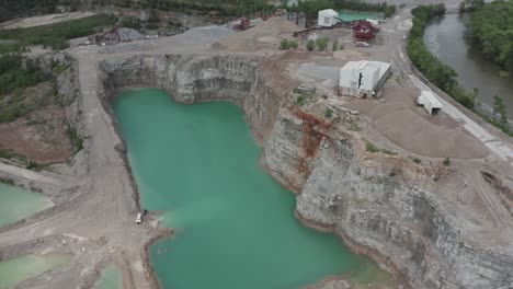 Drone-flyover-a-quarry-in-the-Midwestern,-USA