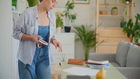 serious woman searching desk documents