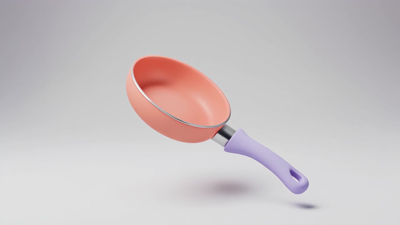 Pastel Pink Frying Pan Floating and Rotating in Studio