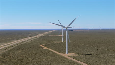 Aerial view of windmills in a desertical area.