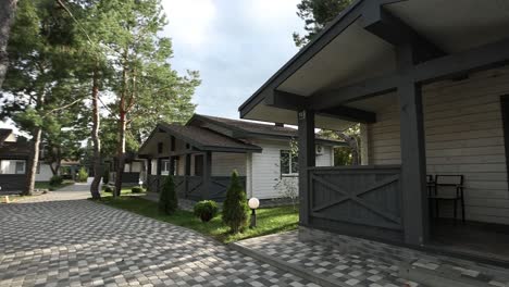 cozy wooden cottages in a pine forest