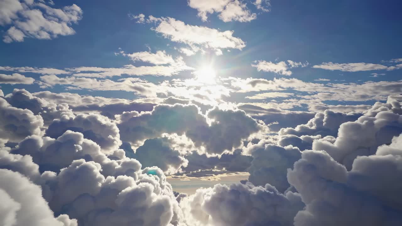 Vídeo aéreo de nuvens iluminadas pelo sol de um ângulo alto, capturando um céu sereno e expansivo
