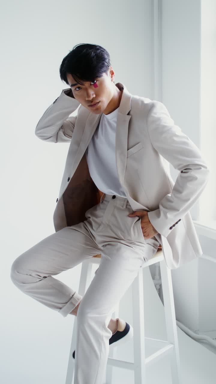 Fashionable Man in Suit Poses for Portrait