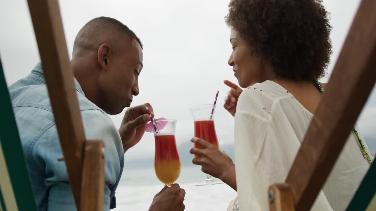 Couple enjoying free time by the sea
