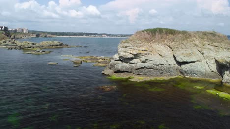 Aerial-drone-shot-of-small-sea-island-in-Black-sea,-Bulgaria