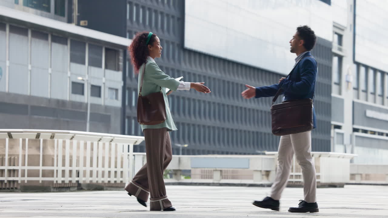 Business people in conversation in an urban setting