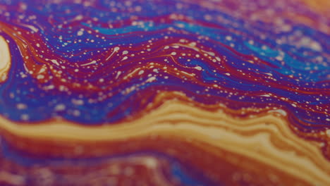 psychedelic slow motion shot of a viscous liquid looking like a lava lamp