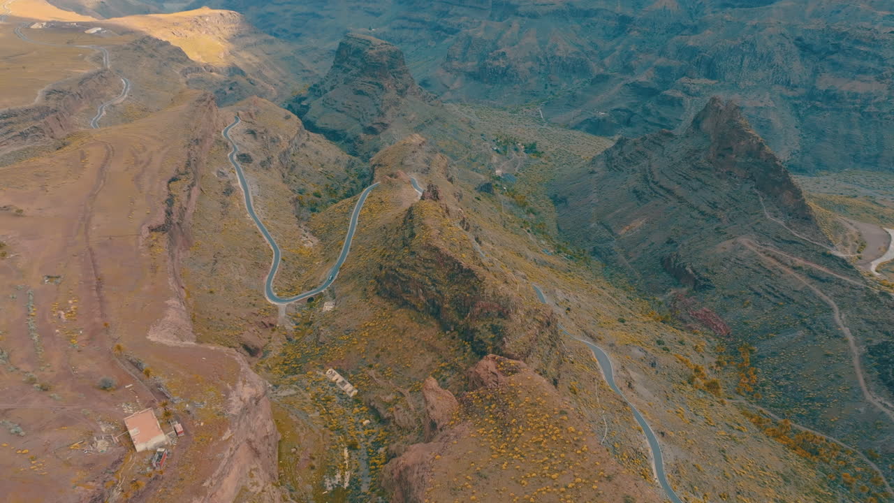 Aerial view of a winding mountain road near the fortress of Ansite in gran canaria, canary islands