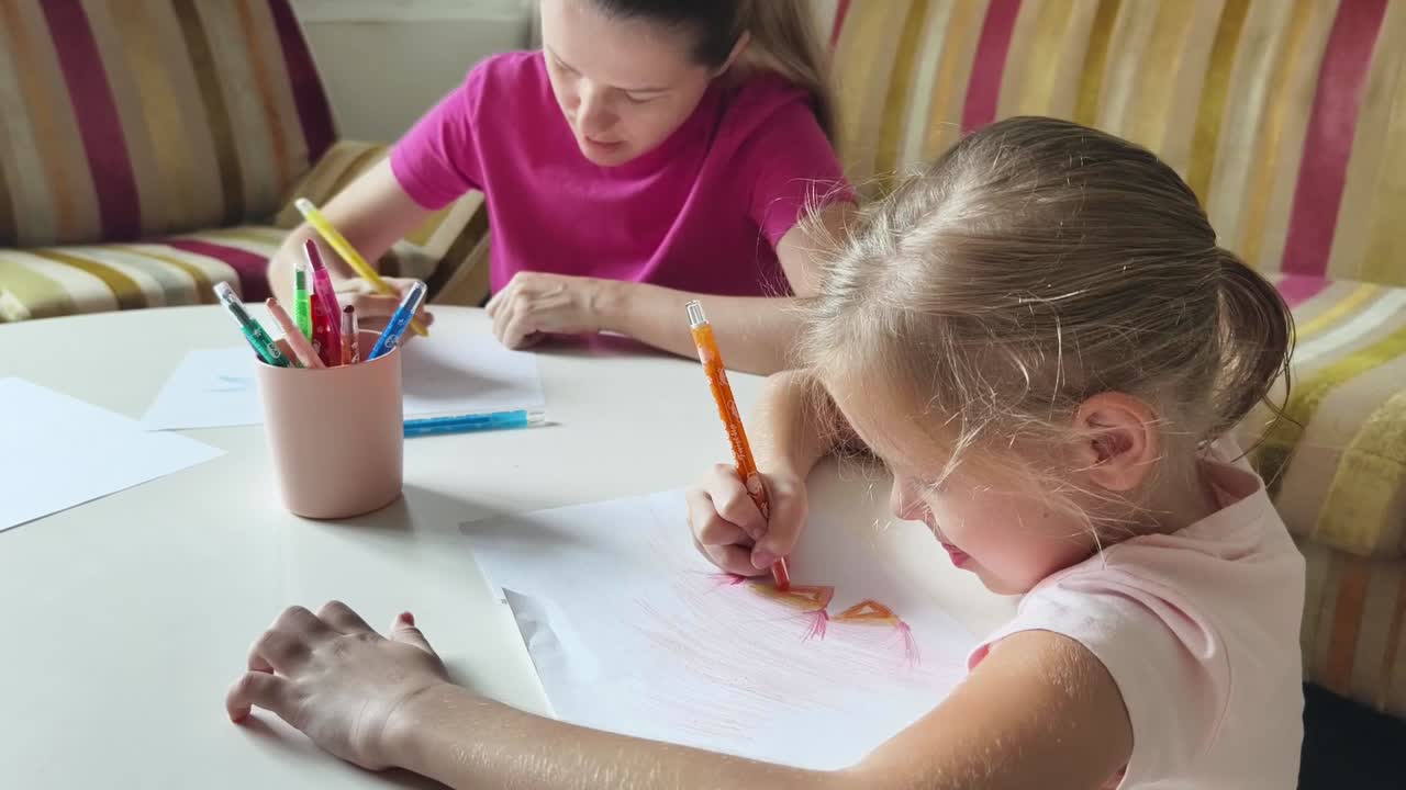 Mother and Daughter Drawing Together