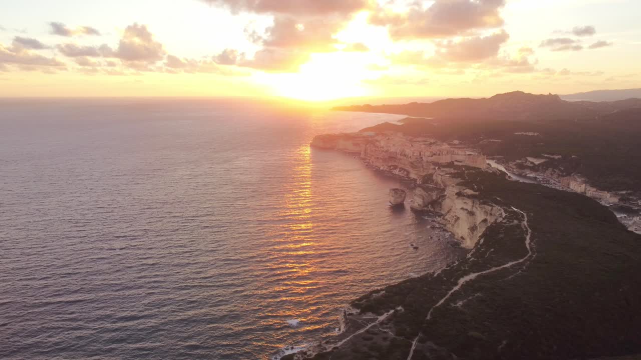Incredible aerial shot of Bonifacio town in Corsica, aerial view at sunset