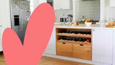 animation of heart icon over empty kitchen