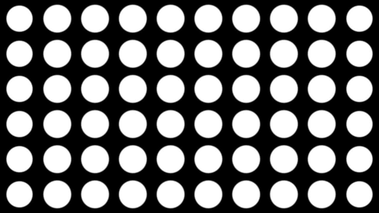 Seamless halftone white dots appear and disappear in motion at black background. Vintage pattern animation