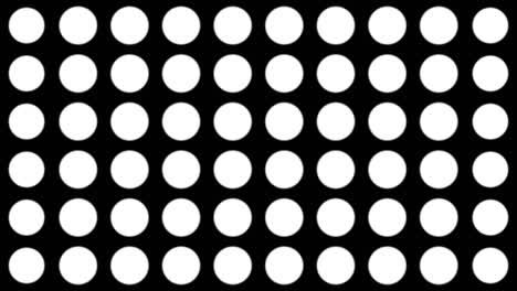 seamless halftone white dots appear and disappear in motion at black background. vintage pattern animation