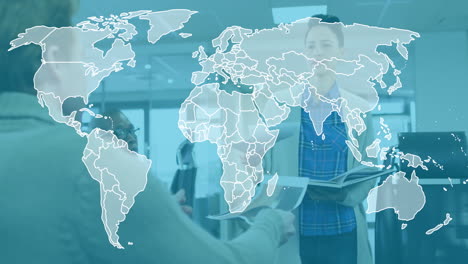 collaborating in modern office, diverse business people using animation for world map