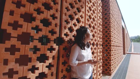 an asian woman in public park.