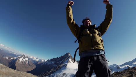 happy hiker on mountain summit
