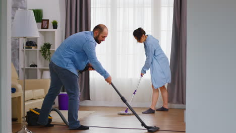 cleaning floor with vacuum cleaner