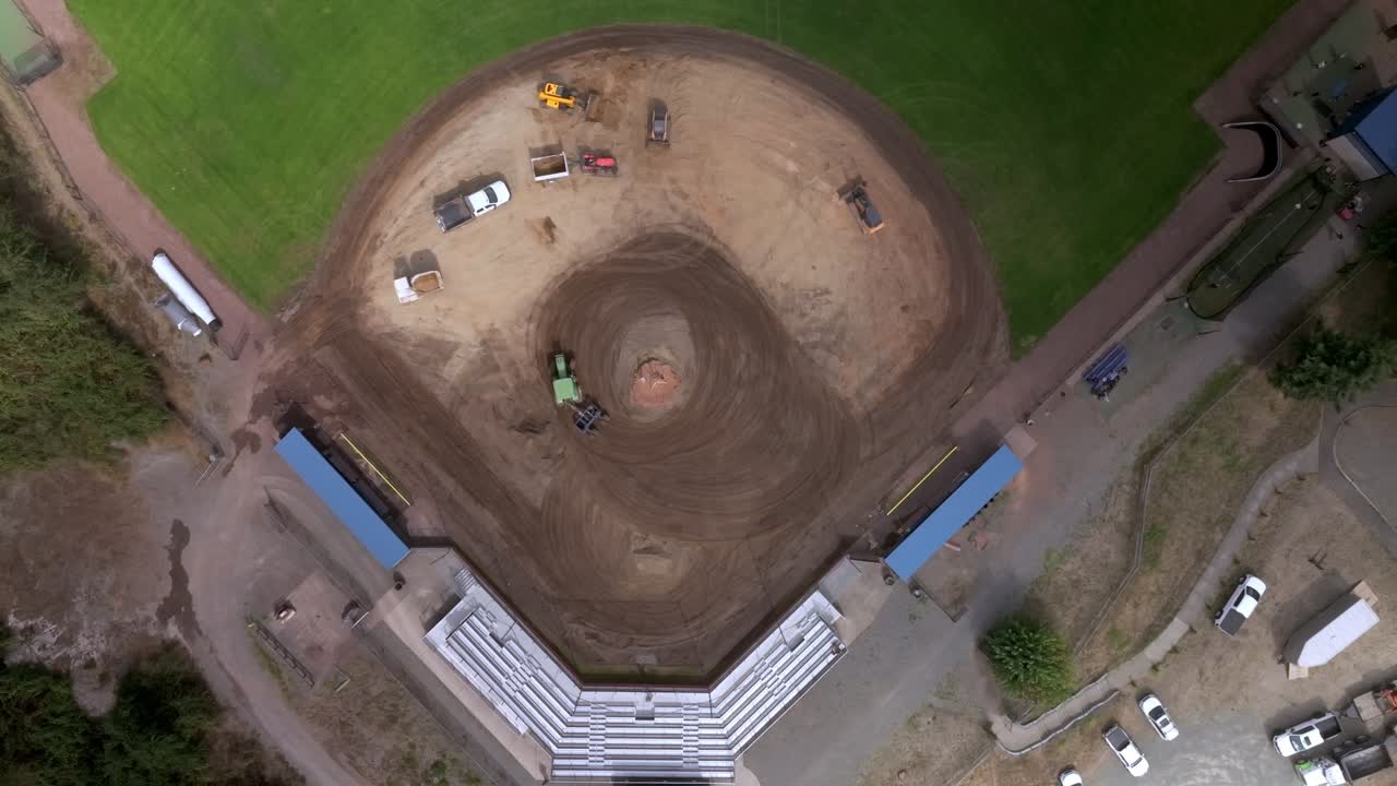 Ground Maintenance Vehicle Working To Maintain Baseball Grounds - Aerial Top Down