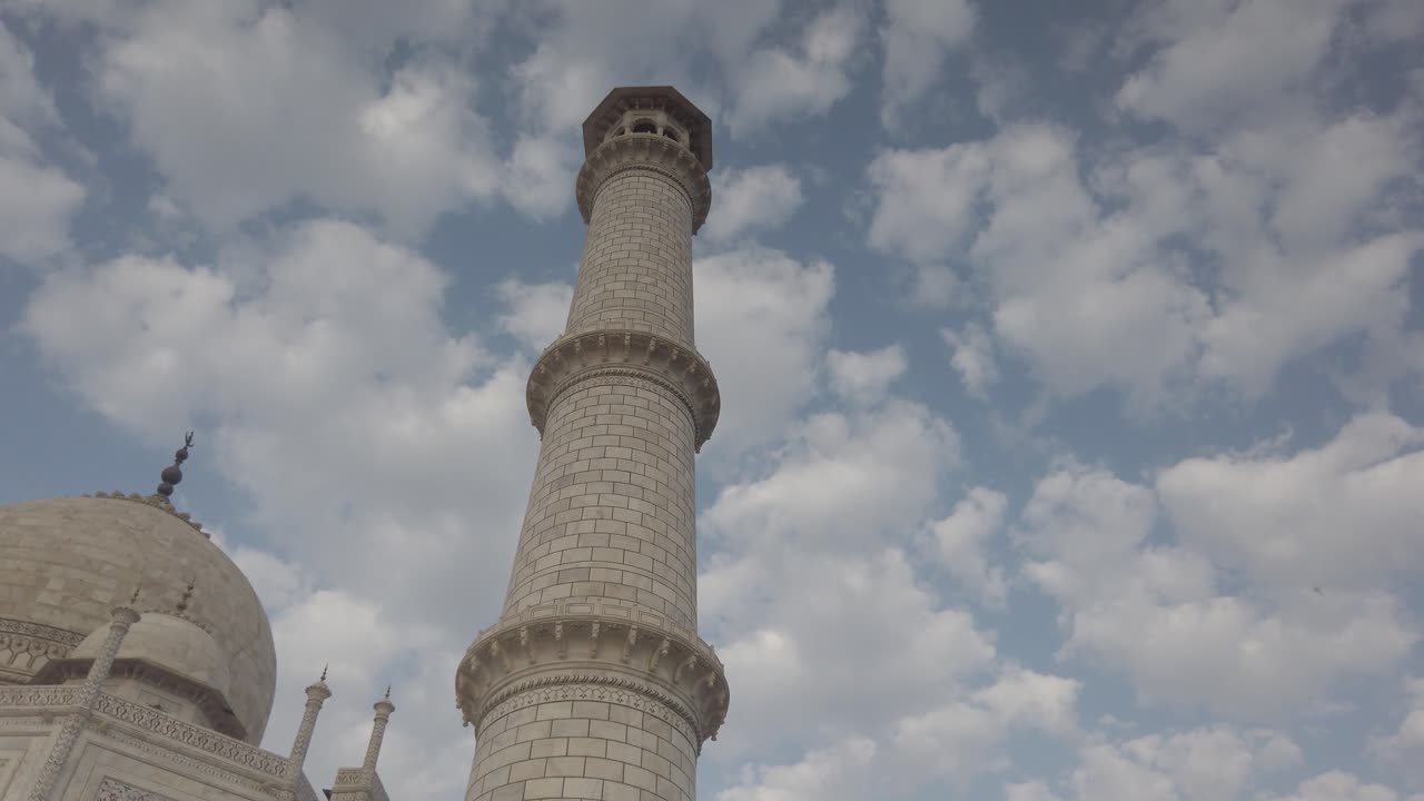 Graceful Tracking Shot of Minaret of Taj Mahal at Agra, Agravanam, Yamuna River, Uttar Pradesh, India.