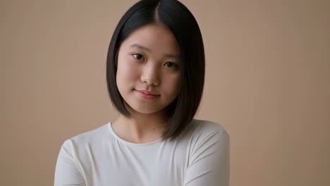 portrait of a young asian woman with different expressions