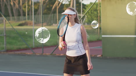playing tennis outdoors, woman surrounded by floating bubbles in animation