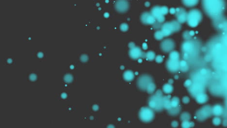 Fly-abstract-blue-particles-and-glitters-on-black-gradient