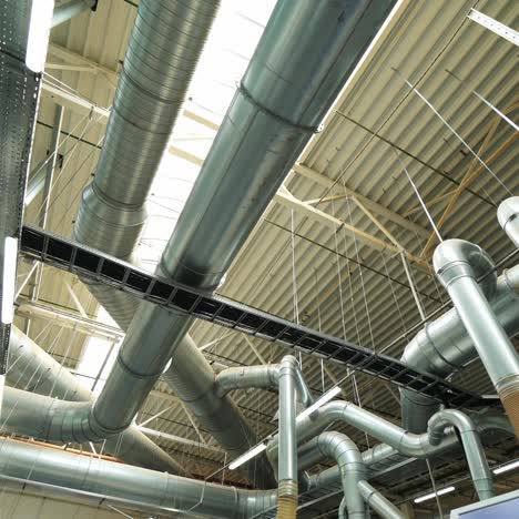 project of the pipe ventilation system at the wood-processing plant. modern floorboard manufacturing plant