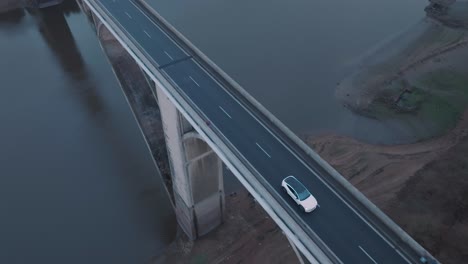 White-Electric-Car-Moving-on-Bridge