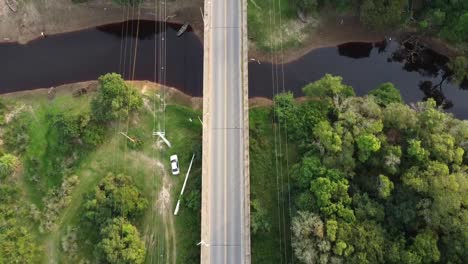 aerial following a road that goes over the paraguay river