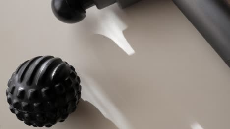 close-up of a black massage ball with textured surface, perfect for muscle relaxation
