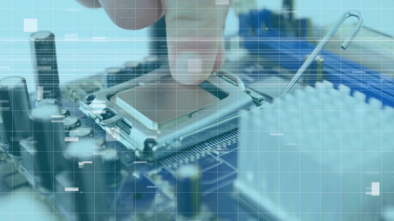 Technician holding CPU chip aligning into socket engaging arm latch locking lever technology build