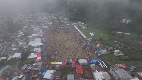 flying giant kites during all saint's day cloudy day in sumpango, aerial