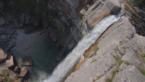 water falling from high rock