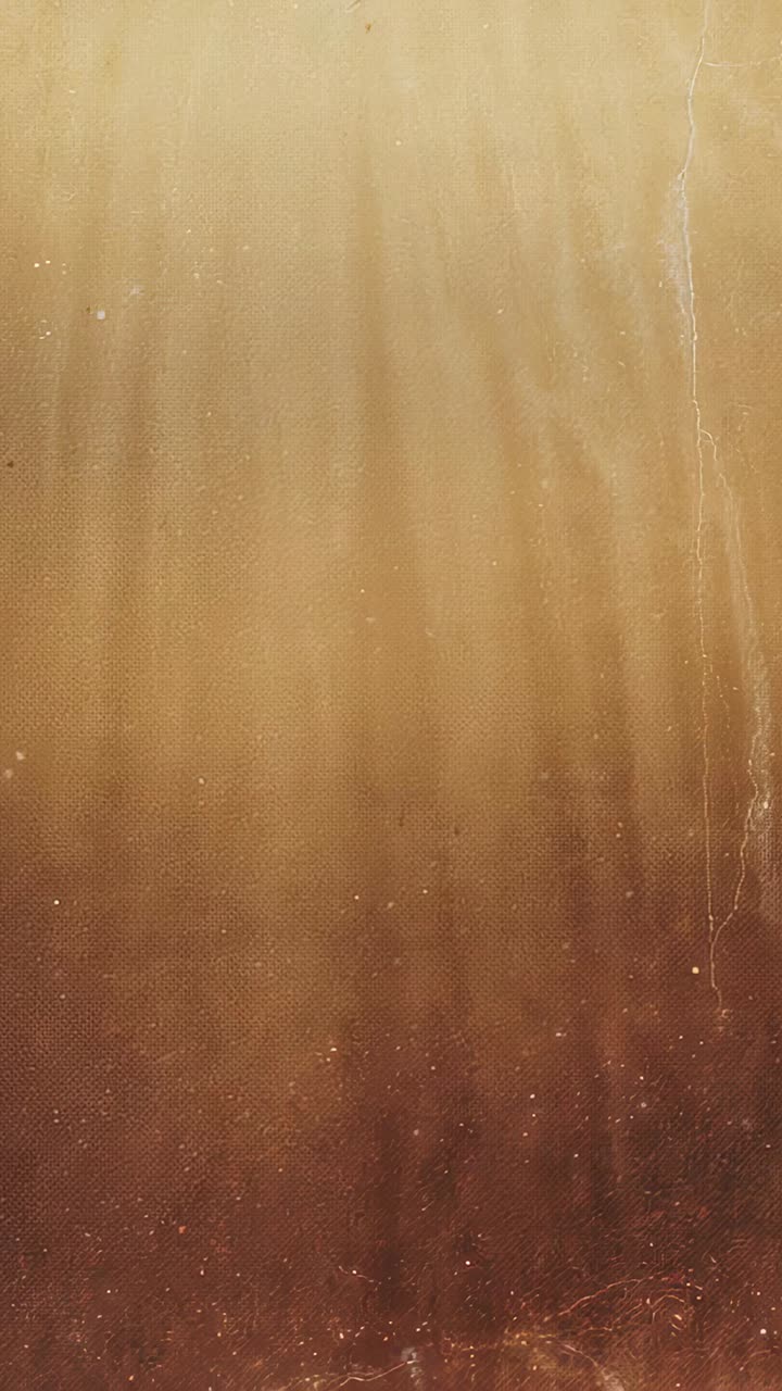 Vertical video: Camera holding textured warm panel in studio, with thin streak and drifting specks