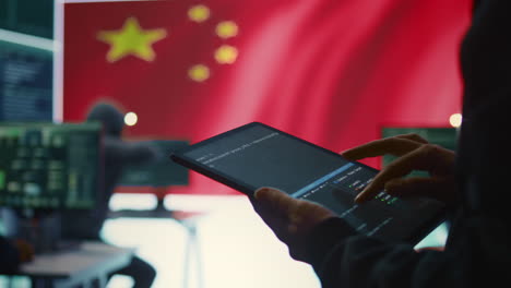 Chinese-hacker-uses-a-tablet-in-governmental-cyber-operations-office