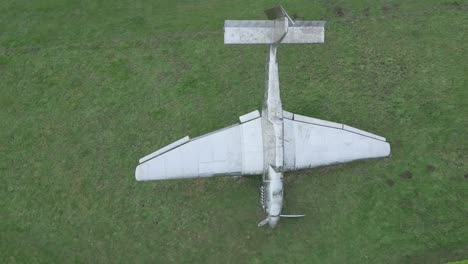 Aerial-view-above-model-of-downed-junker-Stuka-bomber-in-Battle-of-Britain-memorial,-Kent