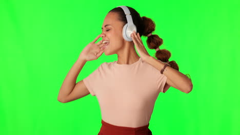 headphones, singing and woman on green screen