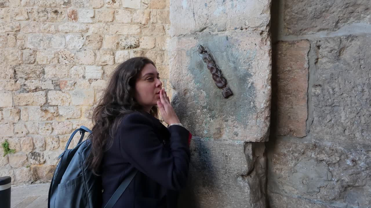 Woman Visiting Historical Religious Site in Jerusalem