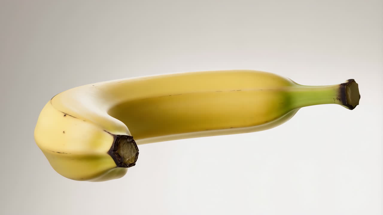 Single Banana on a White Background