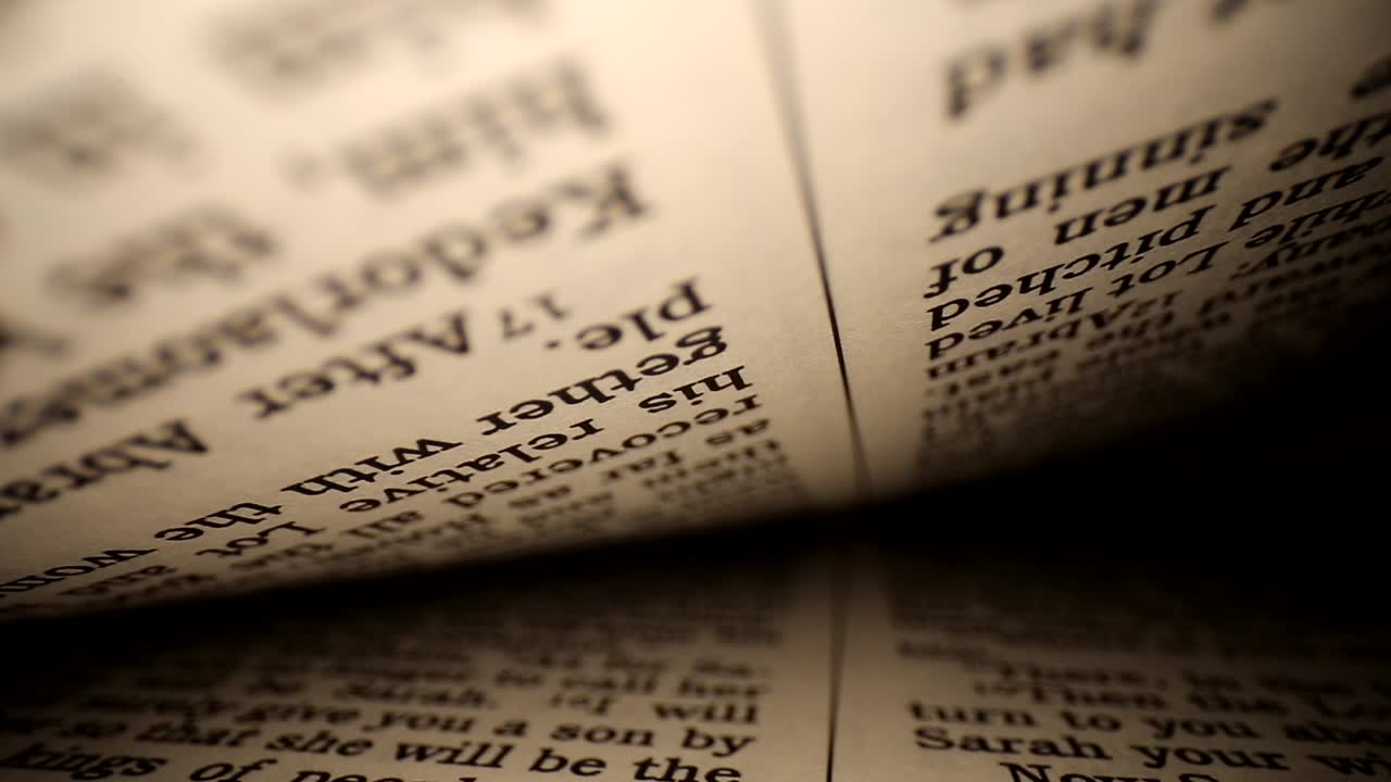 Pushing lens into a book center of page slowly