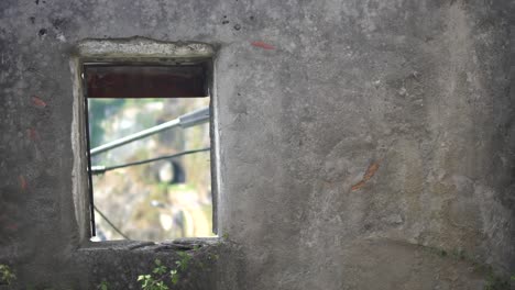 urban window frame looking at a tunnel