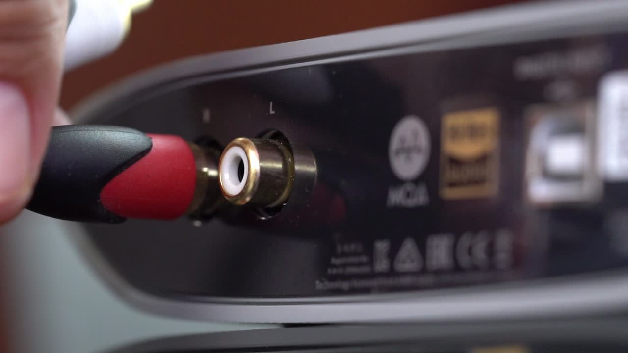 Connecting an RCA Audio Cable to the Input Jack of a Hi-Fi Amplifier