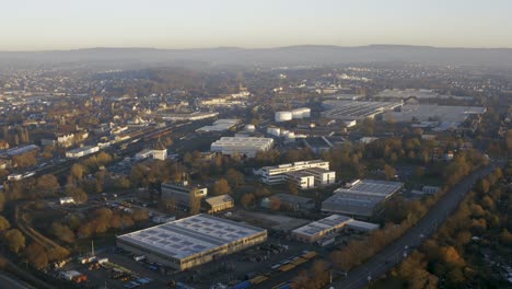 drone shot of the cityscape landscape of kassel in beautiuful soft sunlight and covered in fog
