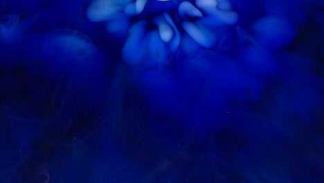 4k beelden. abstract blauw kleurrijke verf inkt achtergrond. diffusie psychedelisch.