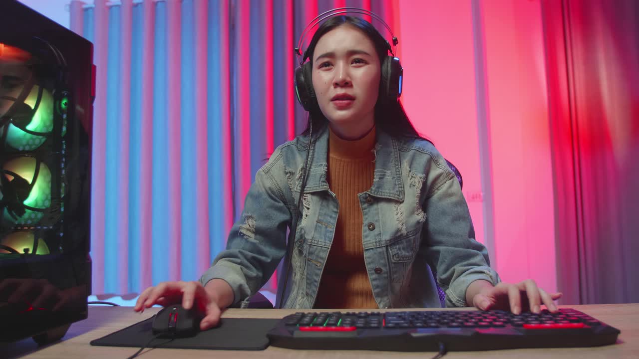Asian Girl Gamer Lose While Playing Video Game On Computer